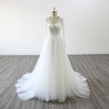 Богемное свадебное платье с длинными рукавами и открытой спиной, расшитое бисером.